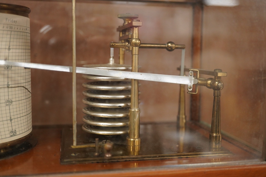 An early 20th century teak cased barograph by Ross, London No.A.529. with drawer underneath containing the original leaflet, spare papers, etc. Condition - fair to good.